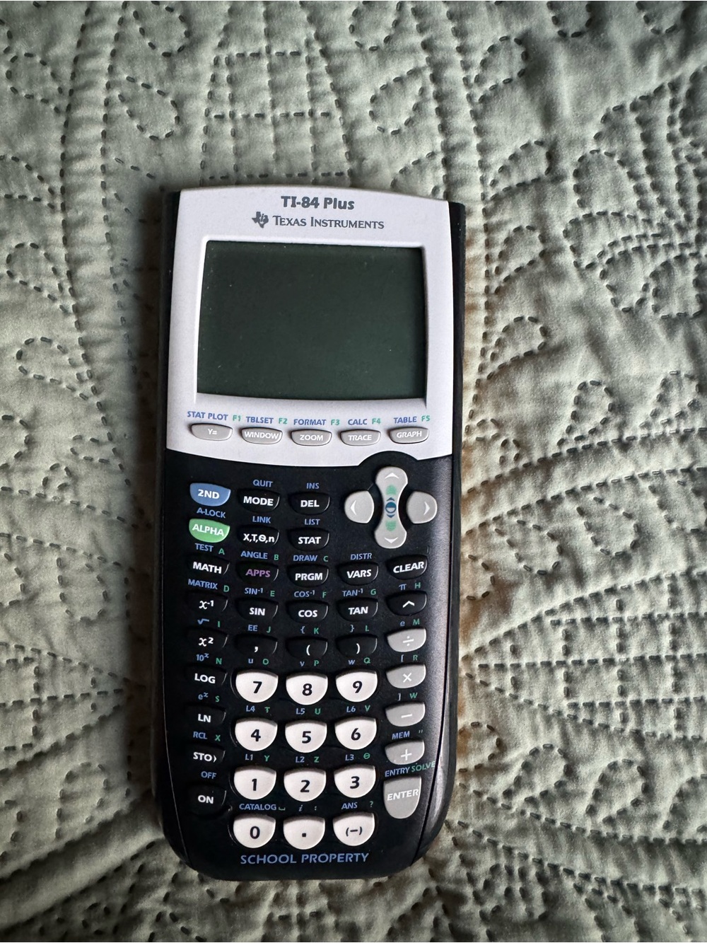 Texas Instruments TI-84 Plus Graphing Calculator - White and Black